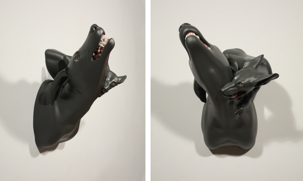 Jessica Teckemeyer Two views of a two polyurethane dog heads intertwined while one bites the other's neck